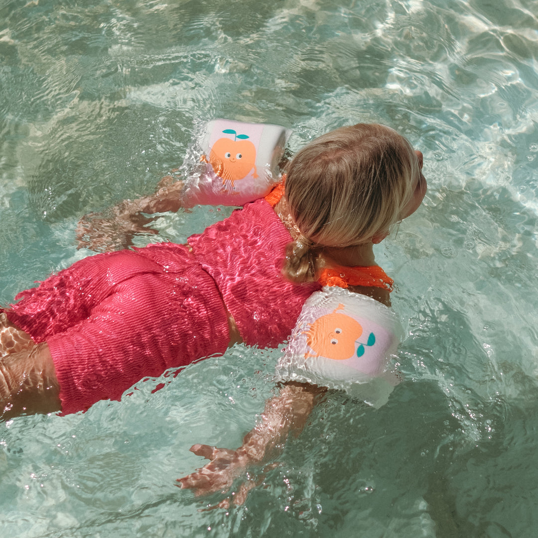 SUNNYLiFE plaukimo rankovės – POPPY THE PEACH PINK STRIPE